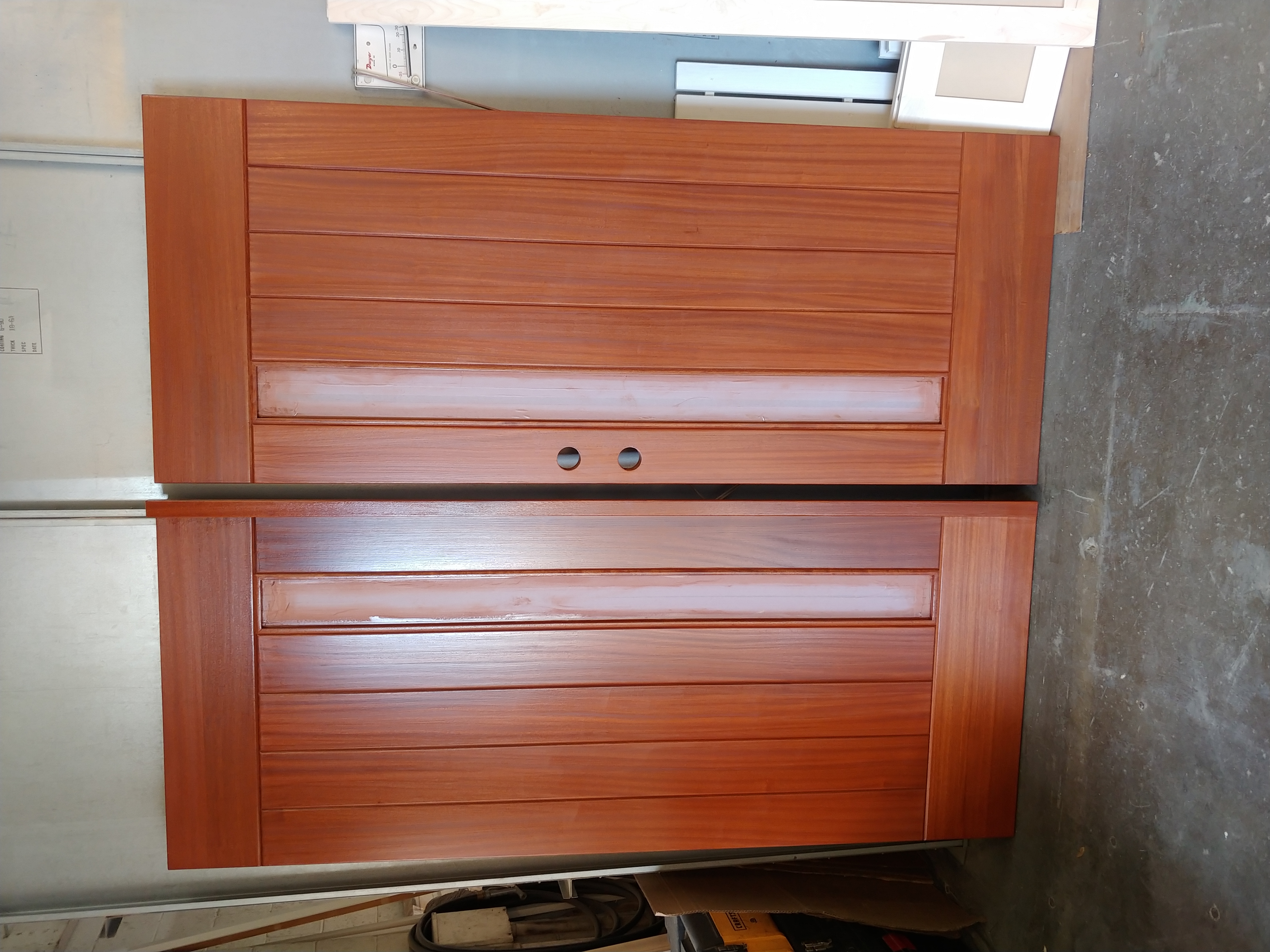 Pair of modern entry doors with mahogany stain